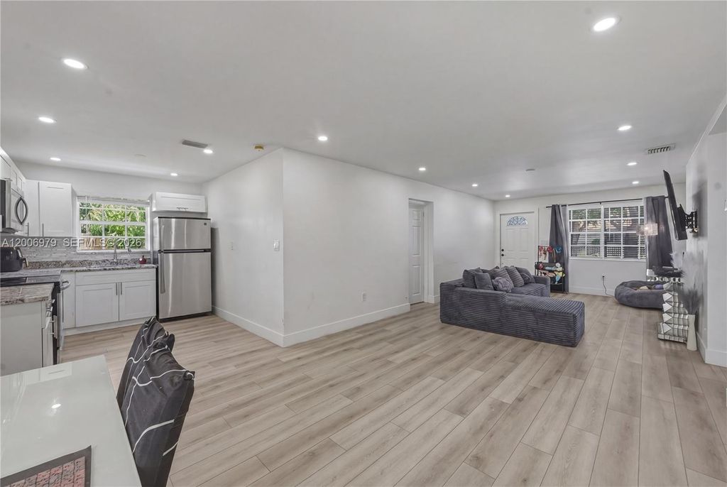 Photo of 1657 SW 44th Ave, Fort Lauderdale, FL 33317 (MLS # A12006979)