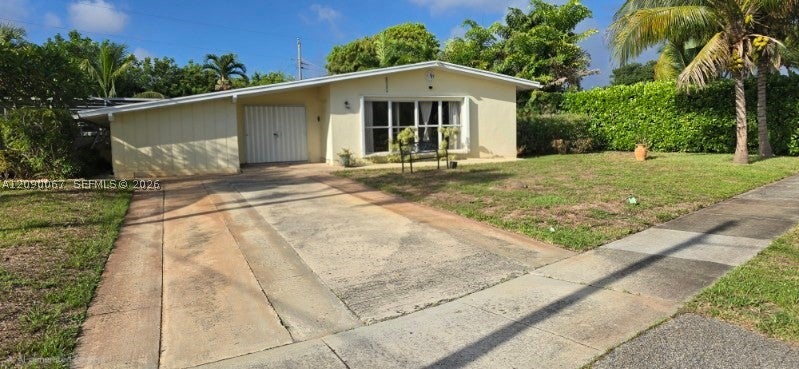 Photo of 1002 W Broome St #1, Lantana, FL 33462 (MLS # A12090067)