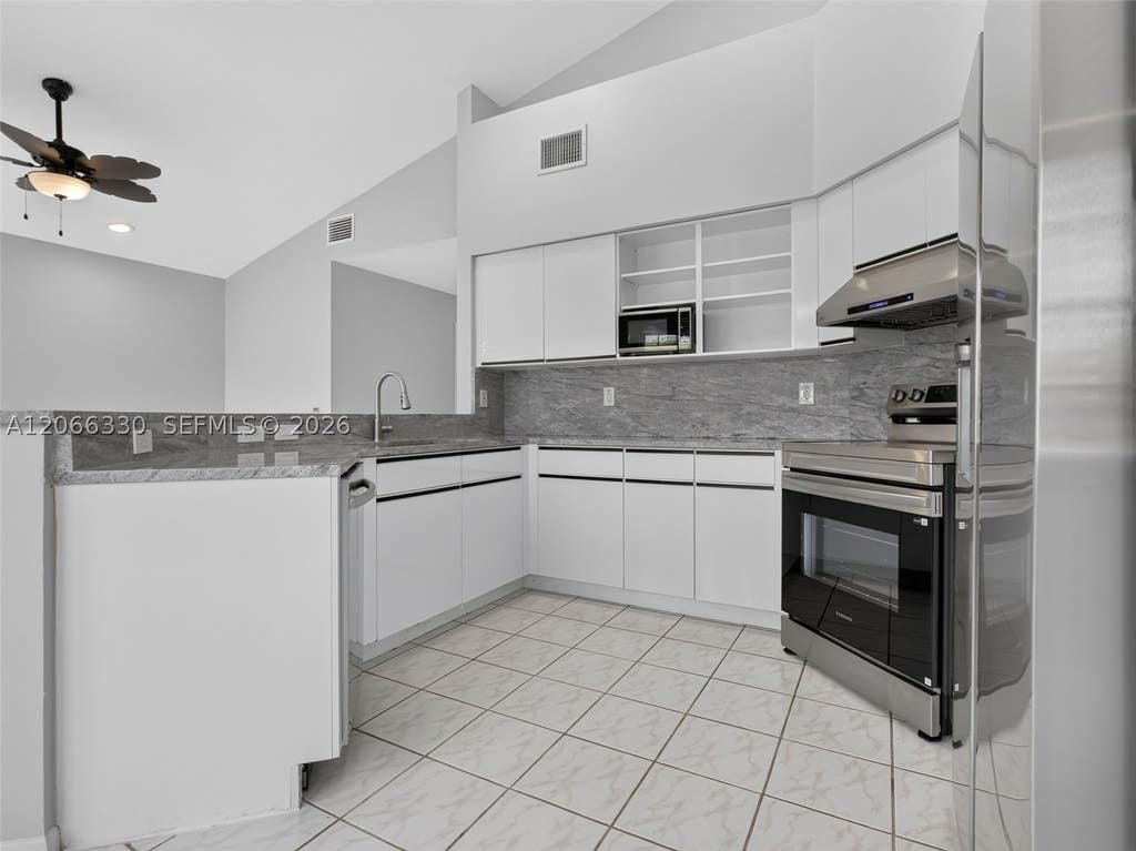 Photo of 1520 Seabay Rd, Weston, FL 33326 (MLS # A12066330)