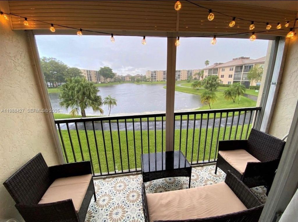 Photo of 7900 NW 50th St #205, Lauderhill, FL 33351 (MLS # A11988427)