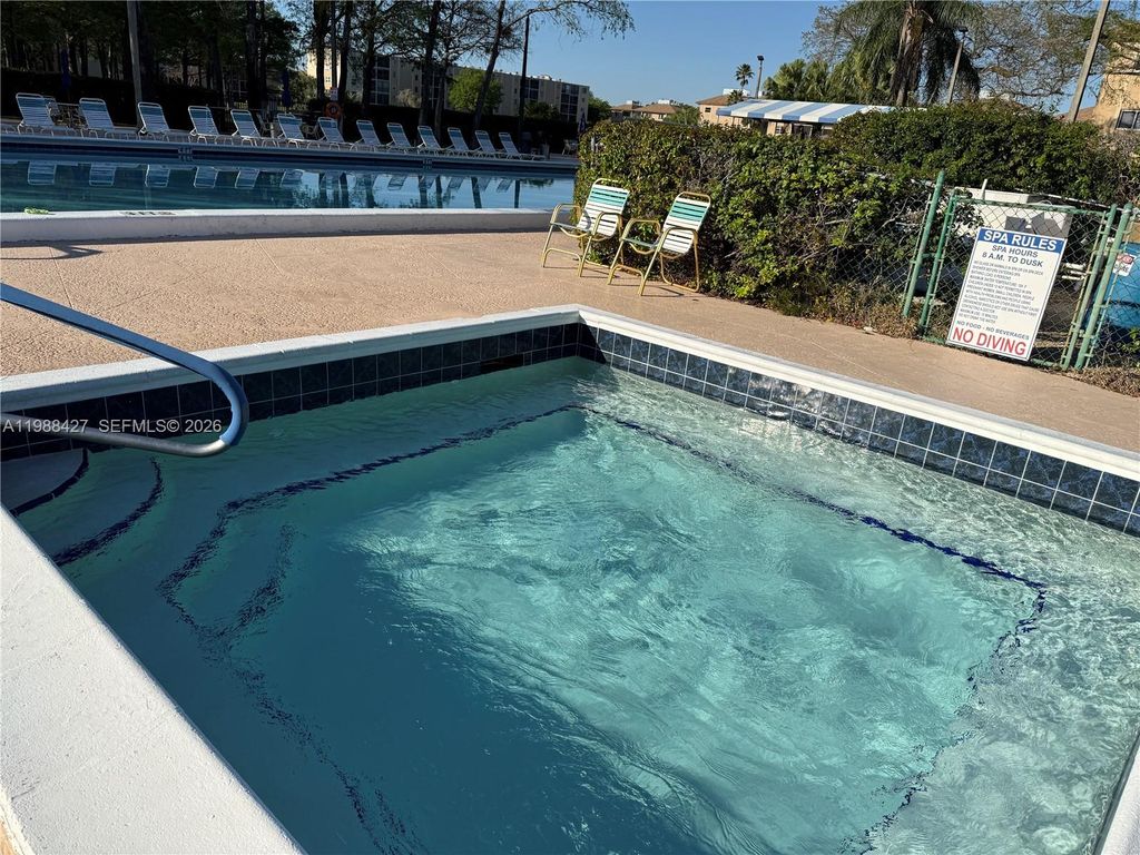 Photo of 7900 NW 50th St #205, Lauderhill, FL 33351 (MLS # A11988427)