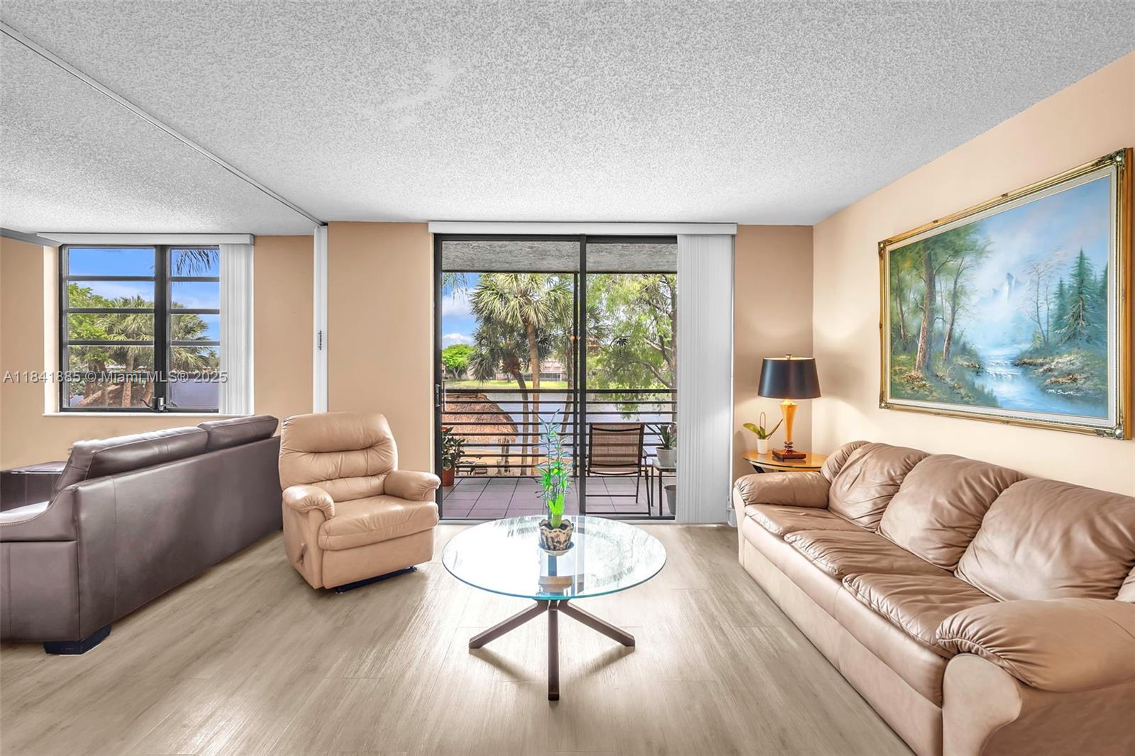 Discover your dream place in the heart of Pembroke Pines, where convenience meets comfort. Updated and bright 2BR/2BA Waterfront Unit, nestled in Colony Point, a 55+ Community.  Open Floor plan Designed to Accommodate Modern Living. The  Kitchen is Adorned with real wood Cabinetry, Granite Countertops, and Sleek Stainless Steel Appliances. The Primary Suite and Guest Room Provide Contemporary Amenities and privacy for residents and their guests, with tastefully updated bathrooms. Step out to your private screened balcony to enjoy a tropical oasis with beautiful lush landscape and a peaceful canal plus a nice seating cabana area, "beach" and barbecue area.
Located close to hospitals, medical offices, shopping centers, restaurants, cinemas and easy access to mayor express ways.