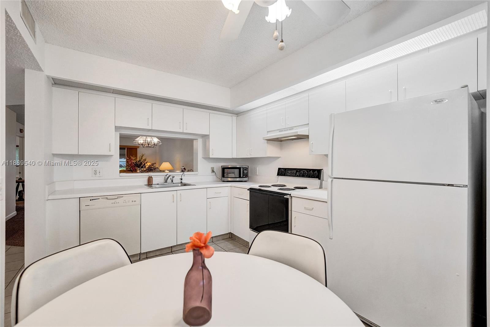 Lovely 2Br 2Ba Jasmine model, conveniently located on the first floor in the newer section of the community, tiled floors, berber carpet, washer & dryer, eat in kitchen with pass through to dining area, pantry, ceiling fans, walk in closet, enclosed patio, freshly painted and carpets cleaned, hurricane accordian shutters on all windows, cable and internet, water and trash included in maintenance. Enjoy this adult living in the community of Century Village with resort style amenities including a million dollar clubhouse, 2 fitness centers, 24 hour guard gated community, pools, tennis, pickleball, movie theater, golf, cafe, complimentary transportation and more. Priced to Sell !!