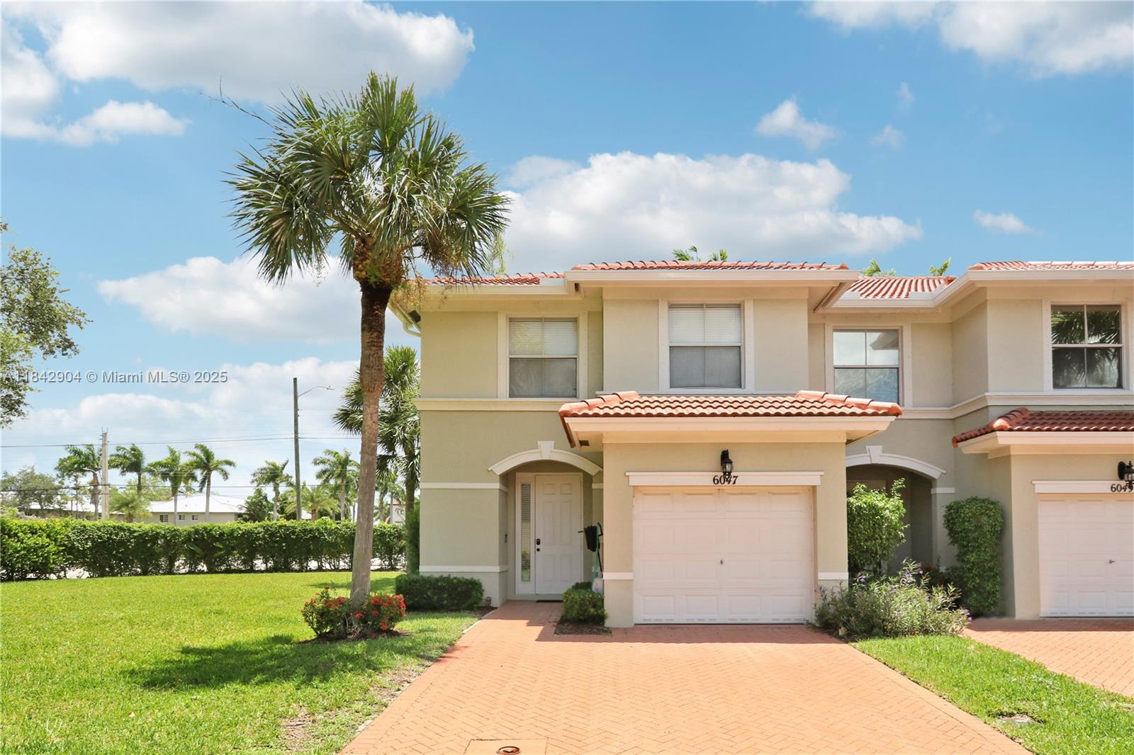 Beautifully furnished and inviting 3BR/2.5BA end-unit townhome in the gated community of Woodbine! Features include an open kitchen with counter seating, spacious bedrooms upstairs, large closets, enclosed porch with built-in bar, and a 1-car garage. Enjoy resort-style amenities: manned gate, pool, spa, gym, playground, sports courts, and scenic sidewalks. Minutes to PBI, Singer Island beaches, downtown WPB, dining, and next to the VA Hospital. Pets considered case-by-case. Your perfect next home awaits!