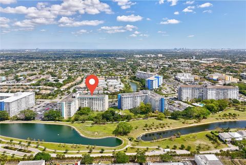 Photo of 4330 Hillcrest Dr #807, Hollywood, FL 33021 (MLS # A11956773)