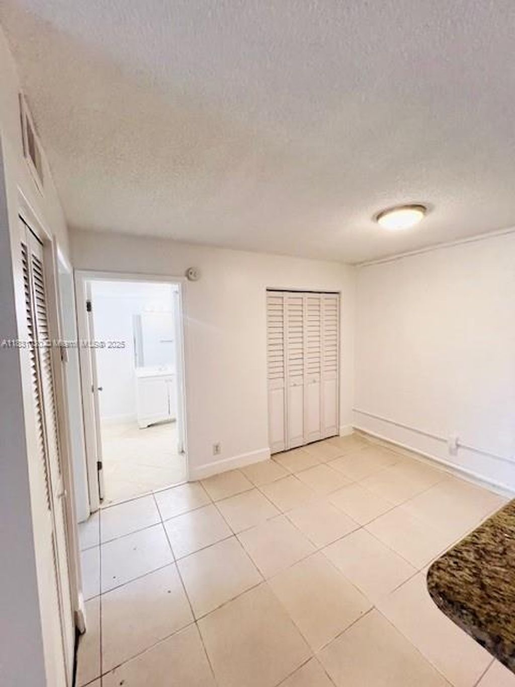 Photo of 10765 Cleary Blvd #103, Plantation, FL 33324 (MLS # A11831030)