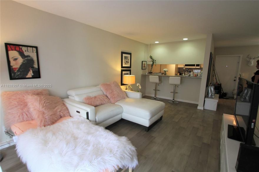 This fully updated apartment with new wood floor, located near FAU and Baptist hospital Boca.  Very low profile building, 2 stories.  The roof was installed 3 years ago.  We have completed concrete restoration 2 years ago.  This first-floor apartment has one parking spot assigned.  Laundry room down the hall. All ages welcome.  Come see easy to show unoccupied.