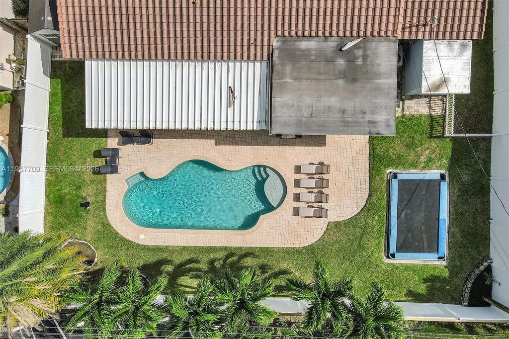 Photo of 1005 SE 9th Ave, Deerfield Beach, FL 33441 (MLS # A11957709)