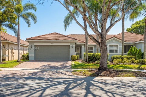 Photo of 1931 Pisces Ter, Weston, FL 33327 (MLS # A12081852)
