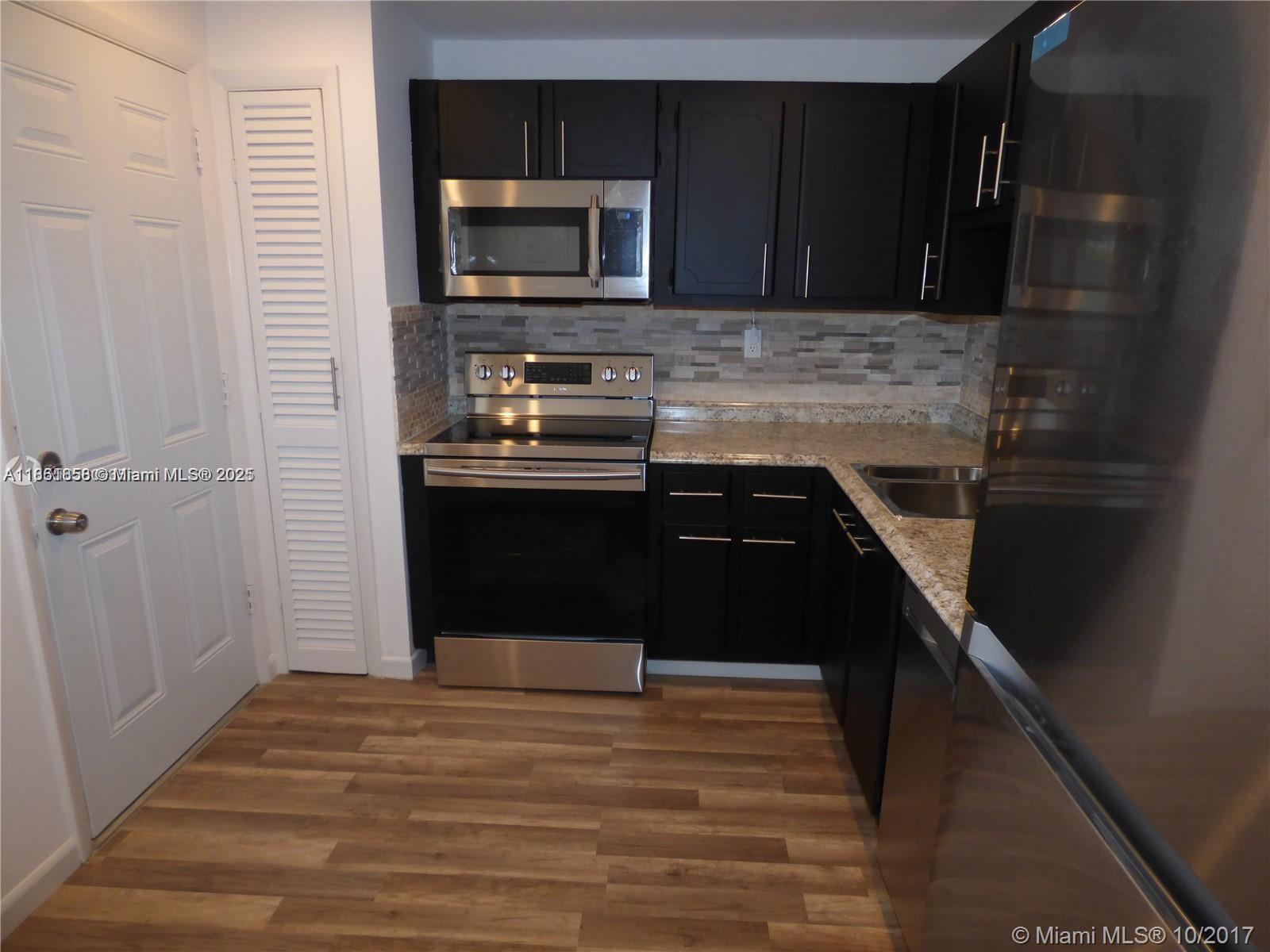 Skylake. Rolling Green. Beautiful Pool View. Remodeled. Highly Upgraded. Large 1 Bedroom. 1.5 Baths. Modern Eat In Kitchen with New Stainless Appliances. Updated Bathrooms. All New Laminate Wood Floors. New Exterior Doors. . Screened Terrace with Roll Up Shutters. Foyer Entry Tenant occupied . Unit will be available 09/15 For showing please call or text listing agent Association requires deposit . Has to be checked direct with association