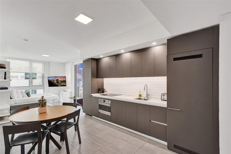 Luxury 1Bdr/1Bath residence in the newly built YOTELPad Miami, perfectly located in Downtown—just one block from Bayfront Park, a 10-minute walk to Kaseya Center and Brightline Station. In Airbnb-approved building, this unit has additional bed in living area (comfortably fits 4 people) and offers Hotel Rental Program, making it ideal for personal use or as an investment property. Inside washer/dryer. Amenities include a rooftop lounge, pool with poolside bar, jacuzzi, restaurant, gym by Homage Fitness, coffee bar, 24/7 front desk, valet parking, and a private resident lobby. HOA covers internet, water, waste management, TV box, and building maintenance. Minutes from Miami International Airport, you're truly at the center of it all. Easy to show just 24 hr notice. Priced to sell!