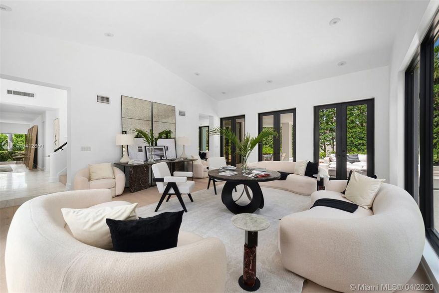 This luxurious modern home (2020 renovation) is situated on a spacious 12,500 SF corner lot on prestigious Sunset Island II. An exquisite marble foyer and soaring 20-ft ceilings greet you upon entering this 4Bed/4.5Bath home. Elegant wide plank European oak floors are bathed in extraordinary natural light. Eat-in kitchen, w/custom cabinetry, a separate pantry, a gorgeous marble waterfall island, and Wolf, Sub-Zero & Miele appliances. Spacious master-suite features two large walk-in closets and a dream bathroom w/soaking tub, Kohler fixtures, decorator-designed Italian Calacatta Gold marble shower, and his & her marble sink vanity. Smart lighting & smart home security. Powder room by Waterworks. Maid’s suite. Backyard oasis w/sparkling pool & the privacy that only Sunset Island can offer.