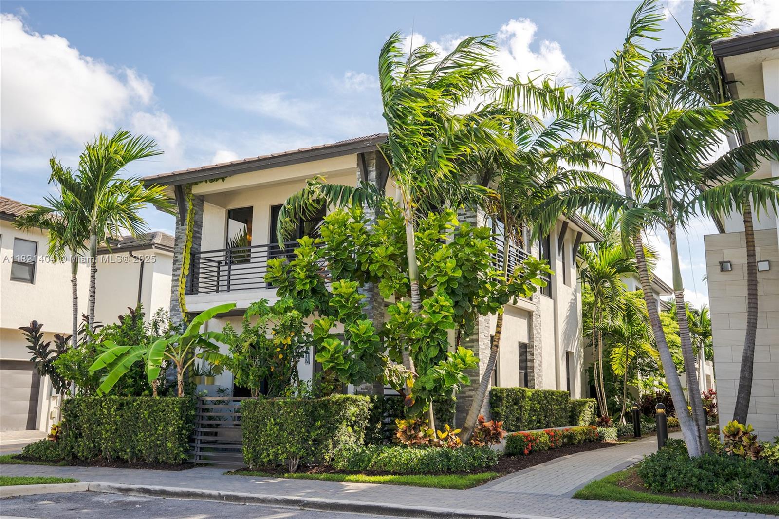 Coming Soon! Exquisite 2019 designer spec home in Doral’s vibrant community (model: corner coastal Ibiza), 3-bed, 3.5-bath, 2,176 sq. ft. single-family masterpiece. Boasts 10' ceilings, 8' doors, impact windows, premium wood Gräber blinds, and wood flooring throughout, including a modern stainless-steel railed staircase. Gourmet kitchen with Jennair appliances and pantry with extended storage. Spa-like master suite with custom walk-in closet, Radiant Health Far infrared sauna, and whole-house de-humidifier. Features matte black LG washer/dryer, in-home water filtration, and an open layout with east-facing patio for stunning sunrises. Extra-large 2-car garage with windows. Steps from Canarias clubhouse with state-of-the-art gym and pool. Meticulously maintained by original owners.