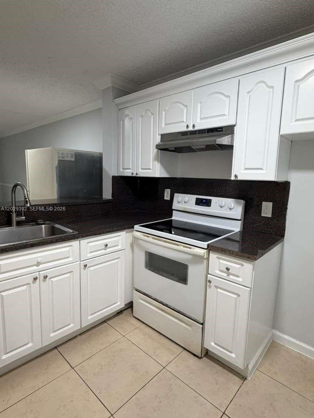Photo of 1150 NW 80th Ave #104, Margate, FL 33063 (MLS # A12029302)