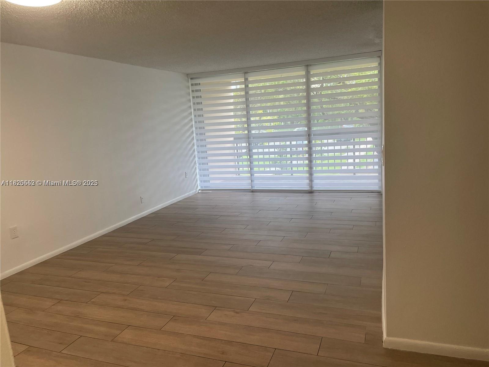 Availabe August 15, 2025. Gorgeously appointed large 2/2 light filled condo in top location of Gardens of Kendall. Huge-sized bedrooms with walk-in closets. 9" ceilings and large windows for plenty of light. Freshly painted, Brand-new floors in bedrooms, brand new bathroom vanities. The managed community offers pool, tennis courts and ample parking area. Do not miss the opportunity to live in this fabulous location across from shops, restaurants, Miami Dade College South Campus and easy access to expressways, Northbound and Southbound Turnpike. Ready to move in.