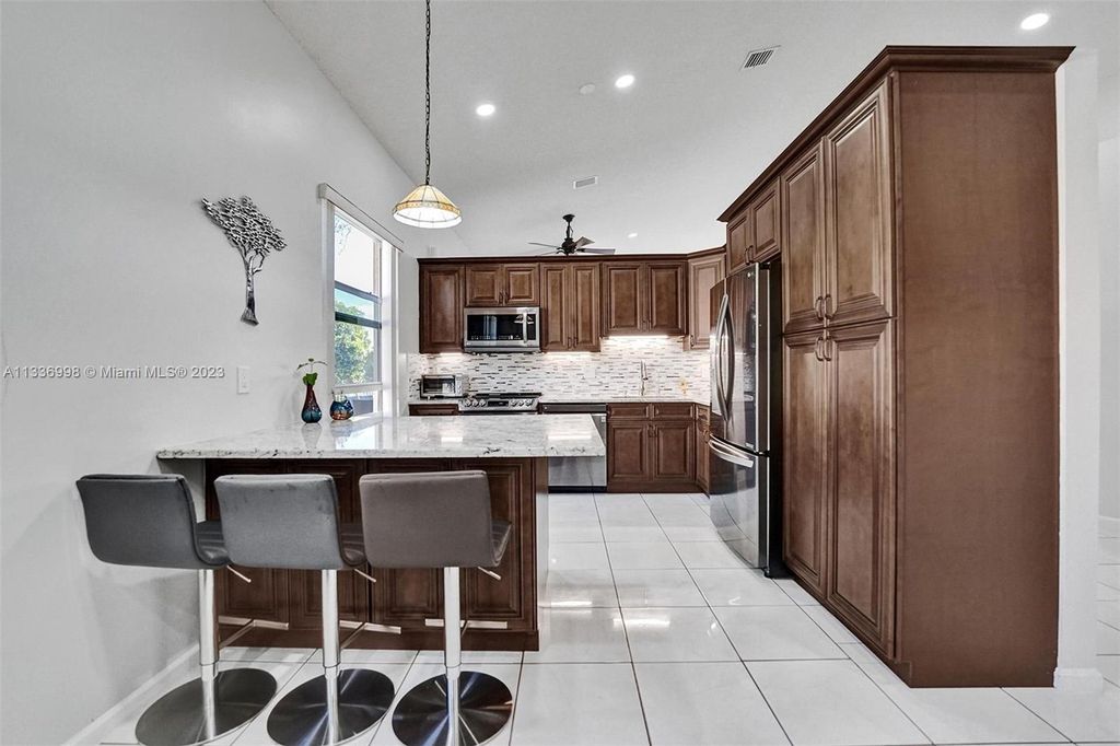 Photo of 4988 SW 151st Ave, Davie, FL 33331 (MLS # A11336998)