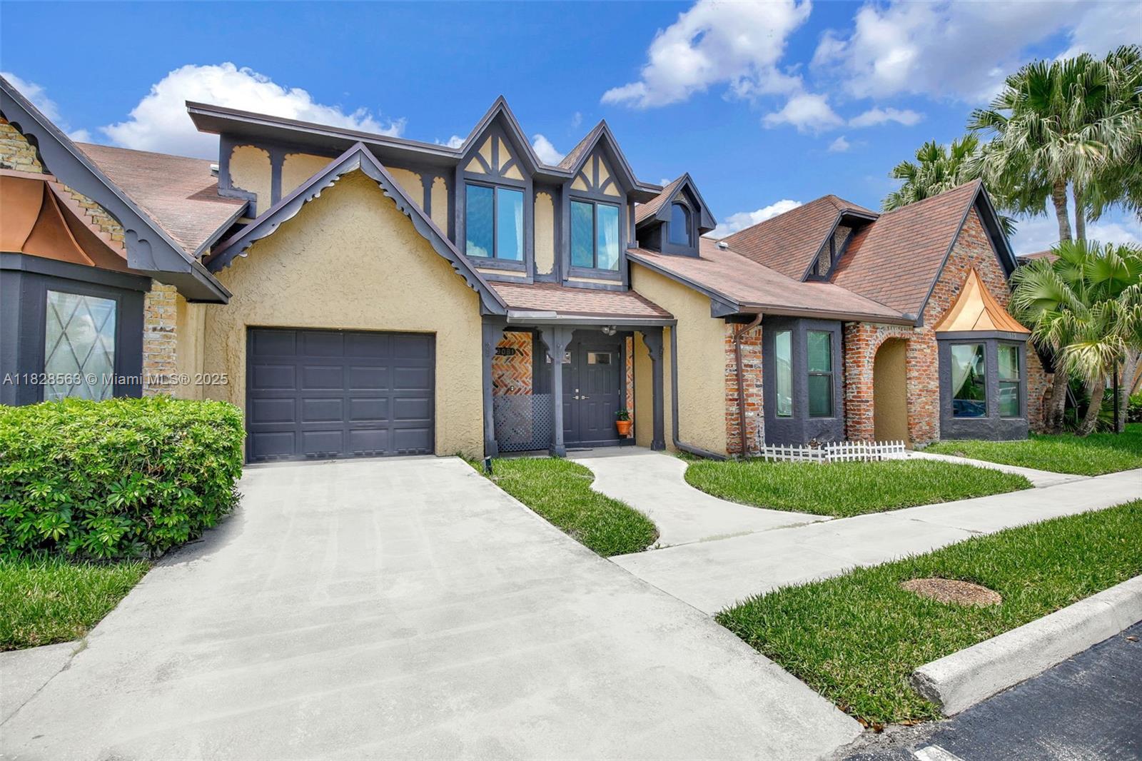 This lakefront 3/2.5 townhome checks all the boxes—impact windows, 2021 A/C, and a newer roof! Just under 1,900 sqft with an open layout, the kitchen boasts white counters, wood cabinetry, and stainless steel appliances overlooking a spacious family room. Garage has been smartly converted into a multi-purpose office/storage/laundry area. The oversized primary suite features a walk-in closet, and the screened patio is perfect for morning coffee with water views. Low HOA and great community amenities make this a must-see!