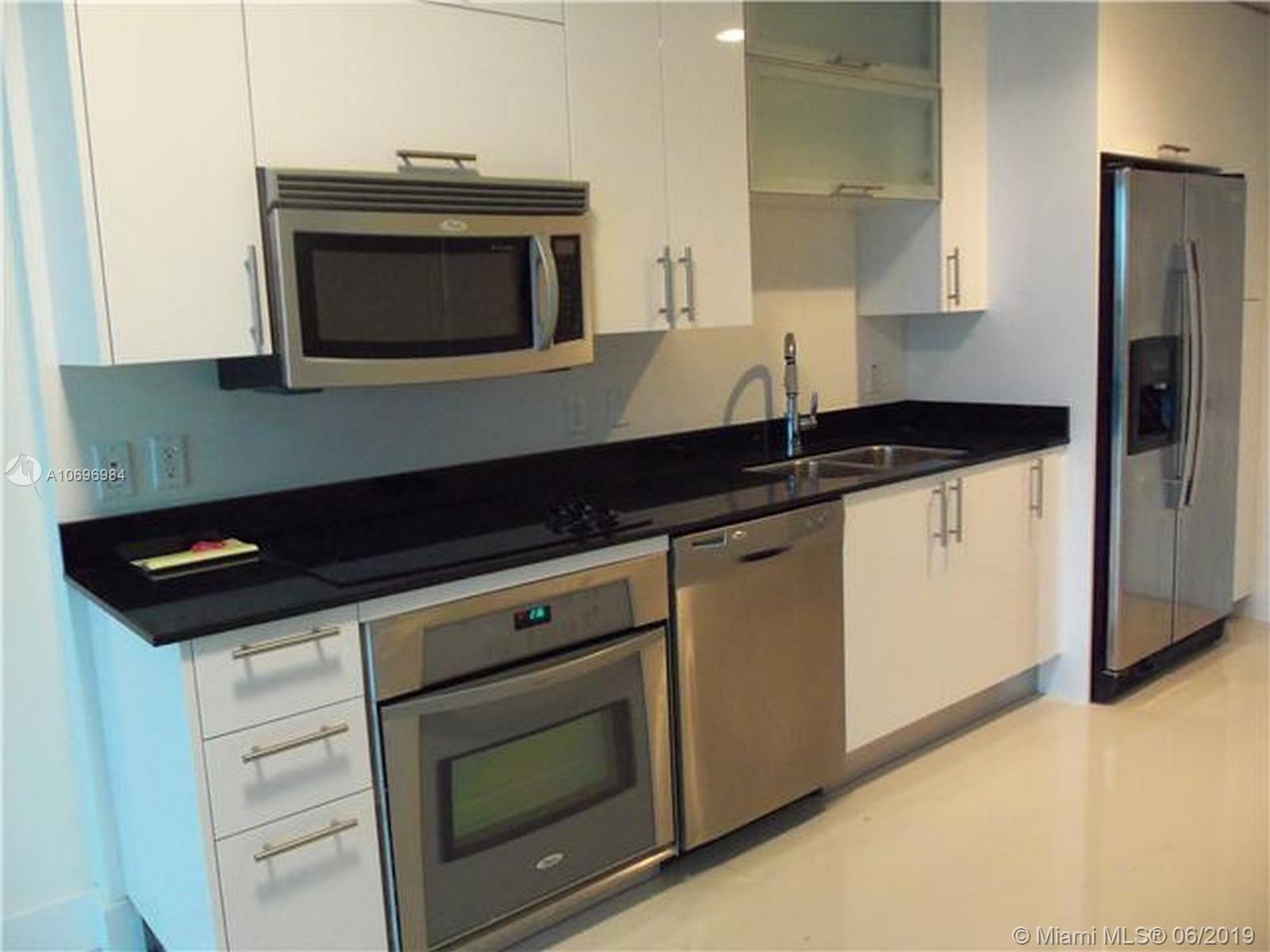 Infinity Brickell. Posh 1 bed-1.5 bath largest floor plan facing east. Great panoramic views, live on 2 floor. Eastern exposure, all white tile, white cabinets, W/D SS appliances, parking, internet-cable.