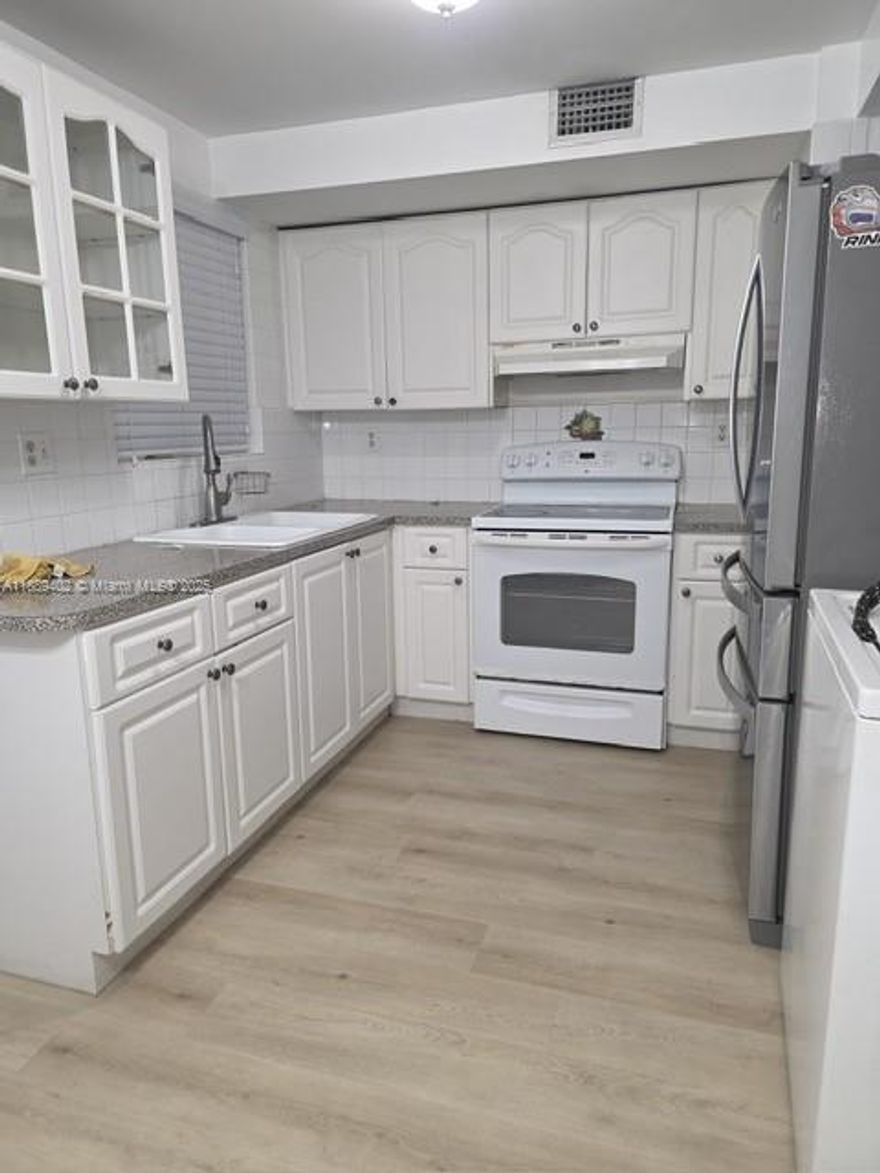 2/2 in Hialeah! 2 stories.  Brand new grey vinyl water proof flooring.  Nice kitchen with nice private porch are for entertaining.  Low HOA at 300/mo.  Has washer/dryher in unit.  No strict rental or approval policies! Schedule a showing today!