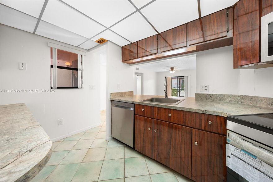 Beautifully upgraded 3-bedroom, 2-bathroom split-plan condo in a gated community. Ideally located near I-95, US-1, Aventura Mall, and the beach, this pet-friendly, all-ages community offers the perfect mix of convenience and comfort. The unit features new stainless steel appliances, new counter tops, tile floors throughout, a new in-unit washer and dryer, and a screened-in patio. The primary bedroom includes an ensuite bathroom and walk-in closet. With one assigned parking spot and plenty of guest parking, this condo is both practical and inviting. Low HOA fees and no rental restrictions. Vacant and easy to show—ideal for homeowners or investors alike!