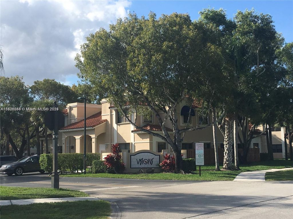 Photo of 501 RACQUET CLUB RD #63, Weston, FL 33326 (MLS # A11626044)