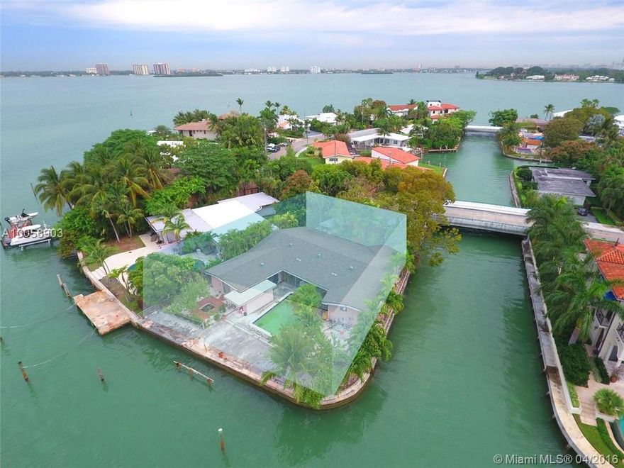 Incredible and rare South facing corner point lot on guard gated Biscayne Point. Build your dream home and enjoy a water view from every room!  12,150 SQ FT lot with commanding wide bay vistas Islands. Existing home with appx. 3,000 SQ FT can be utilized but is in need of renovations.