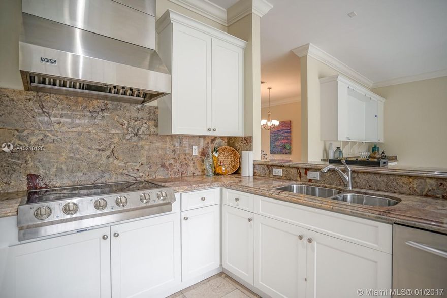 2006 NEW, UPDATE 2016. 5 BEDROOMS /4 FULL BATHS HOME IN EXCLUSIVE RIO VISTA. OFFERS AN OPEN & BRIGHT FLOOR PLAN, JERUSALEM STONE FLOORS, HIGH CEILINGS, CROWN MOLDING & TRIM, FRENCH DOORS. OPEN LARGE EUROPEAN KITCHEN W BREAKFAST AREA & FAMILY ROOM OVERLOOKING GARDEN & POOL AREA. ONE BEDROOM W FULL BATH DOWNSTAIRS. HUGE MASTER / LARGE WALK-IN CLOSETS W PRIVATE BALCONY. LANDSCAPED 135 FT DEEP PROPERTY. HEATED POOL / HOT TUB. HIGH TECH UPGRADES INSTALLED BY OWNER