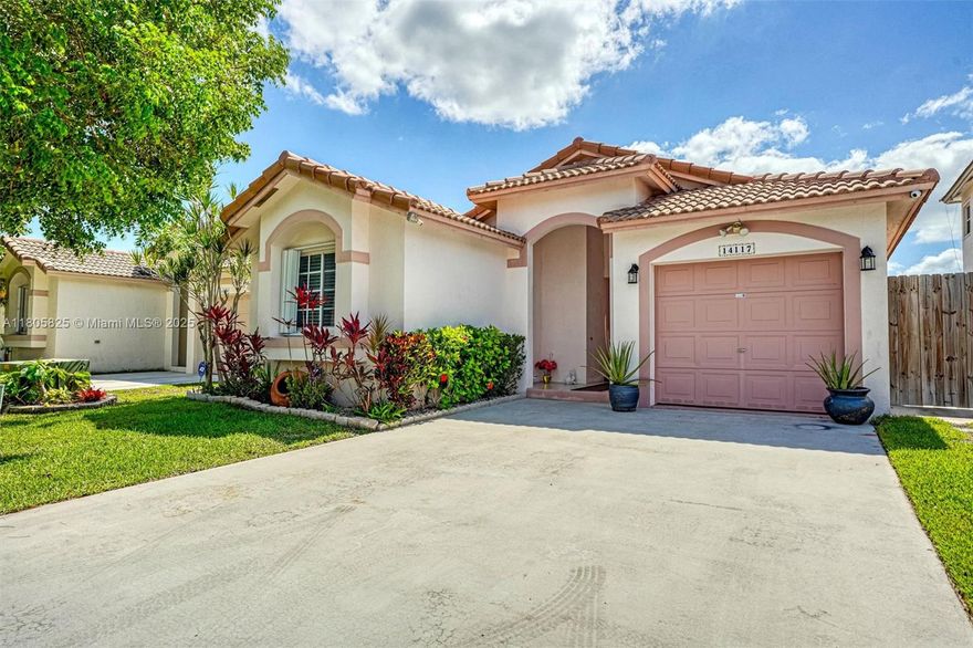 Welcome to your next home! This well-maintained 3 bed, 2 bath gem features a timeless tile roof and elegant tile flooring throughout. The updated kitchen shines with a new dishwasher and a range in excellent condition. The spacious master suite boasts a walk-in closet and private shower. Enjoy peace of mind with accordion shutters and a water heater under a year old. Relax under the patio awning or entertain on the stylish paver patio. This home is in a gated community and blends comfort and reliability—nestled near top schools and shopping.