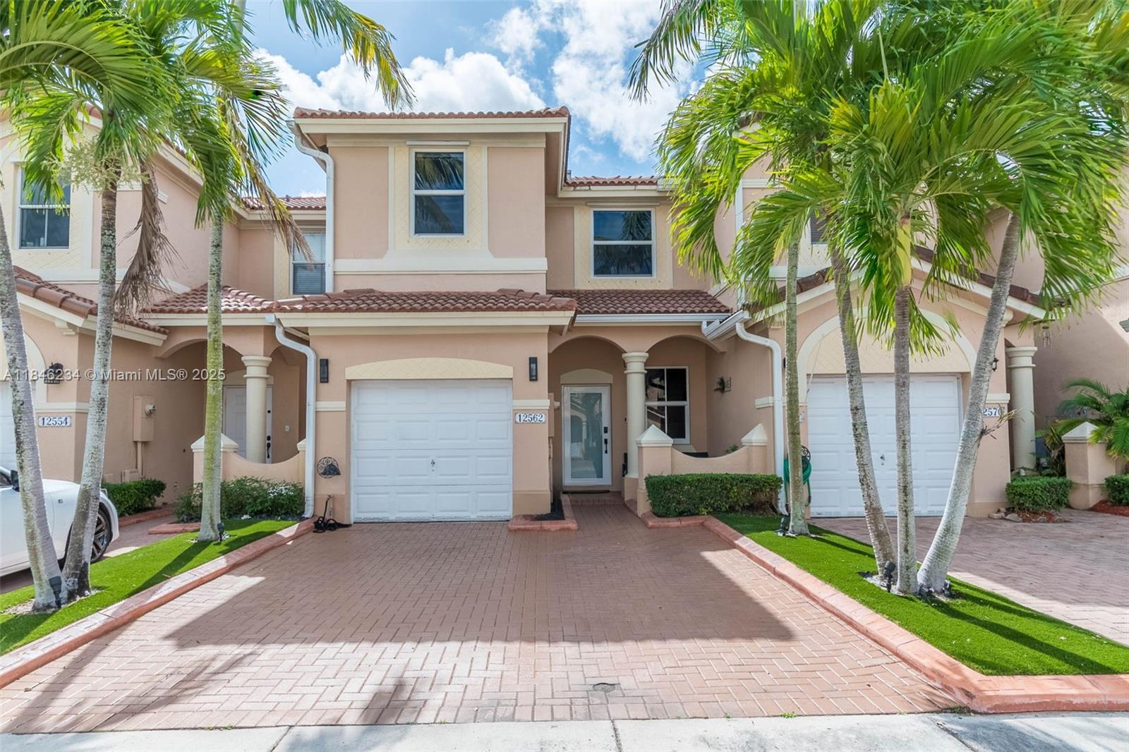 In the lovely community of Kendall Breeze. Beautifully remodeled 3-bedroom, 2.5-bathroom townhouse blends style and functionality. Many upgrades, including impact windows, brand new roof, remodeled kitchen, large tile floors. Beautiful and peaceful patio covered throughout with Marmol perfect for BBQ entertaining and dining. Enjoy remodeled bathrooms for your daily routine. One car garage. Centrally located, easy turnpike access. Walking distance to Publix, Starbucks and good restaurants. This family-oriented neighborhood features A+ schools for all ages! Move-in ready. Kendall Breeze offers many amenities, a Club House, 3 pools, one gym and 3 playgrounds, and the property is just short walk to one of the pools and gym.