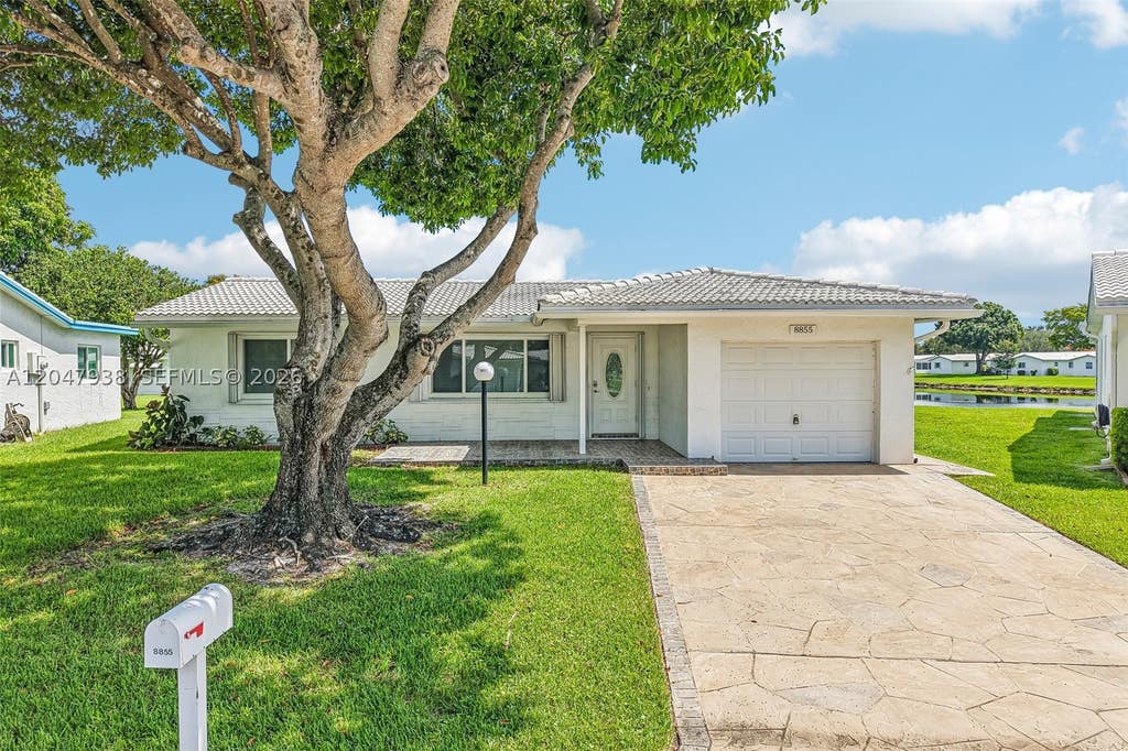 Photo of 8855 NW 10th Pl, Plantation, FL 33322 (MLS # A12047938)