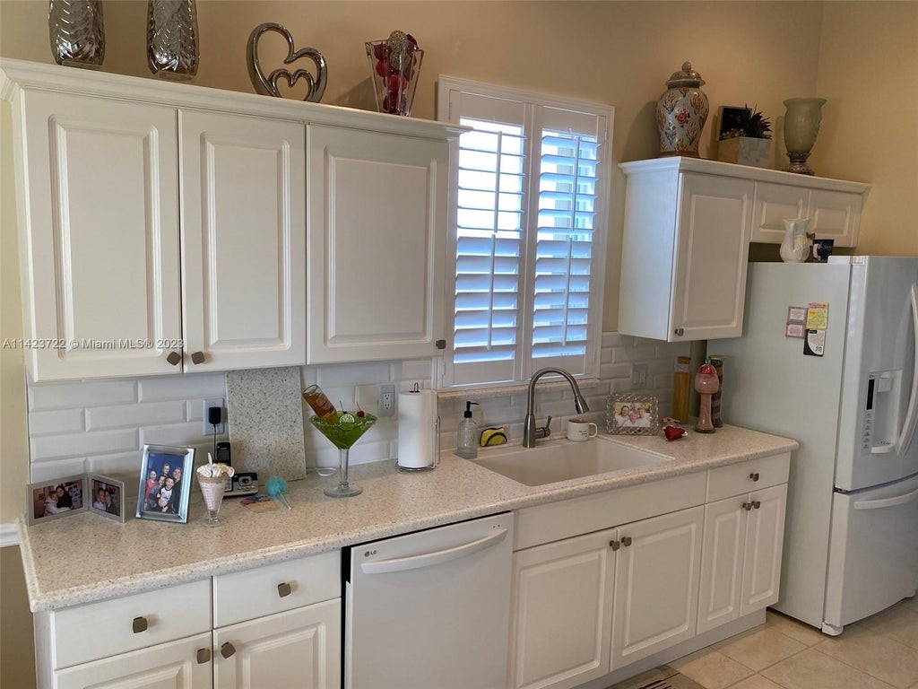 Photo of 7190 Lorenzo Ln, Delray Beach, FL 33446 (MLS # A11423722)