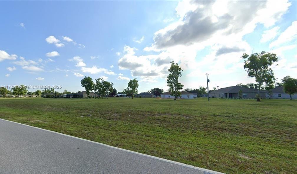 This property listing is an inviting opportunity to build your dream home in the desirable Burnt Store Village Community. The community itself offers an array of amenities, including a scenic lake, a gazebo, basketball courts, and walking trails, creating a peaceful and active environment for residents. Additionally, its prime location, across from a marina with boat slips and ramps, offers convenient access to Gasparilla Island. For those who enjoy outdoor activities, this is an ideal spot for boating and exploring nearby attractions. Burnt Store Village is located just minutes from downtown Punta Gorda and Cape Coral, ensuring that you have easy access to shopping and the airport. The area is surrounded by beautiful new homes, contributing to the overall charm of the neighborhood.