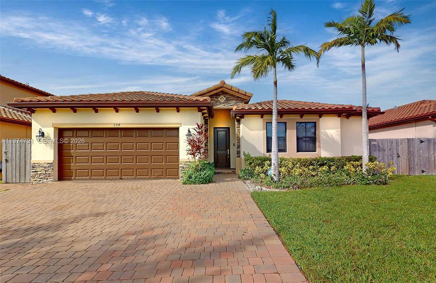 Seller Motivated!  Take advantage Now with a $15,000 seller's contribution in the beautiful Portovita community in Homestead.  Take advantage of this spacious 5-bedroom home located in a desirable gated community.  The property features a functional layout with an additional living area that has been converted into a 5th bedroom, offering flexibility for guests, a home office, or extended living space. The home includes comfortable living and dining areas and a private backyard with a premium lot.  Conveniently situated near the Florida Turnpike, Homestead Hospital, shopping centers, and restaurants, making commuting and daily errands easy. Community amenities include a clubhouse with pool, jacuzzi, gym, and controlled access entry.  Great opportunity for a primary residence or investment.