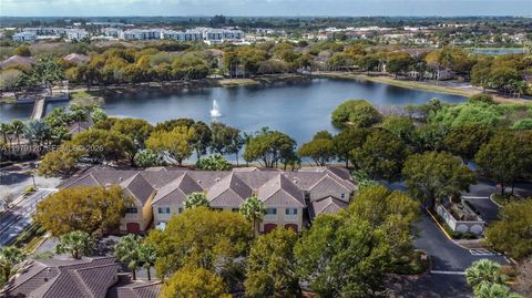 Photo of 2442 Centergate Dr #202, Miramar, FL 33025 (MLS # A11979125)