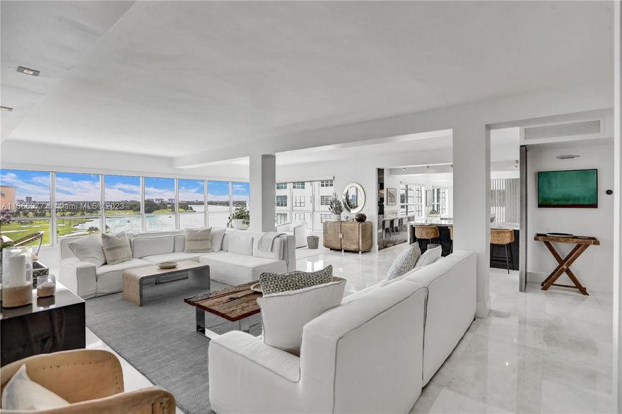 Sensational views from every room! Expansive (nearly 3,000 SF) 3BD/3.5BA combined double-unit within an incredible waterfront location. The floor to ceiling panes of glass create a brilliant, sun drenched environment, while providing breathtaking views of the renowned Indian Creek Golf Course plus the sunrise-sunset views of the ocean, city skyline, Miami Beach and surrounding islands. The sophisticated architecture and luxury finishes include 9 ft ceilings, remote duo-zone NEST, marble floors/ and baths, Calacatta/Sub-Zero/Italian lacquer gourmet kitchen, plus a 2nd kitchen/butler pantry. Heated bayfront pool, gym and valet service. As the largest residence on the southernmost tip of Bay Harbor Islands, this unit is one of a kind!