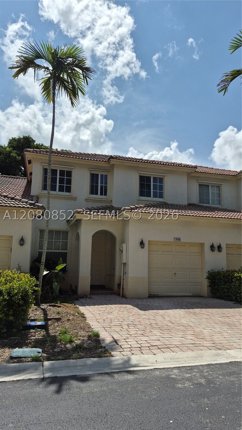 Photo of 1908 NW 79th Way, Pembroke Pines, FL 33024 (MLS # A12080852)