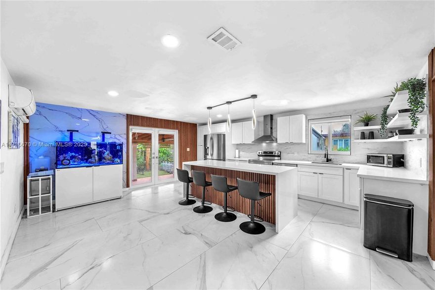 "Absolutely beautiful 3/1 single-story home located in West Miami. As you step into this inviting, freshly painted, remodeled space, you’re greeted by a spacious living room, offering a cozy atmosphere with the option for the landlord to leave the existing furniture or remove it. Beyond the living room, double doors lead into the open, remodeled dining & kitchen area. The kitchen, with its modern touch, is equipped with sleek stainless steel appliances, ideal for preparing your favorite meals. The layout allows for privacy with the ability to close the doors between the living areas when desired. The bathroom also boasts a modern design. The house has 3 parking spaces with a remote-controlled fence for added security & privacy. Large backyard for entertaining family BBQs and gatherings.