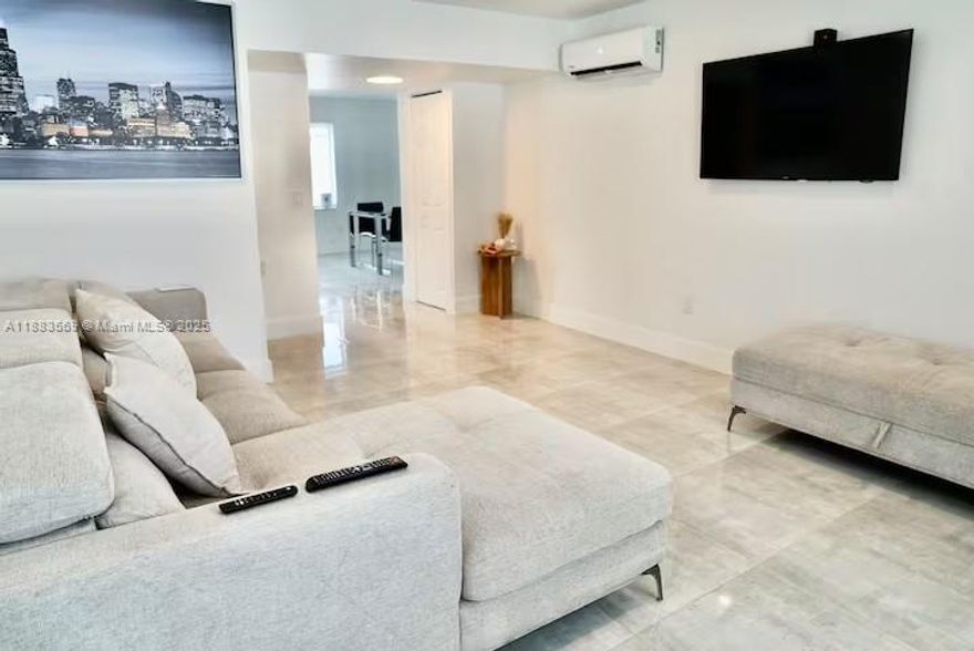 This unique multifamily property offers two separate residences on a spacious corner lot, blending style, comfort, and investment potential. The main home is a fully furnished 3-bedroom, 2-bathroom retreat featuring marble and tile flooring, an open-concept layout, and abundant natural light. Adjacent to it is a private 2-bedroom, 1-bathroom guest house with its own entrance and utilities—ideal for family, guests, or rental income. Located just 10 minutes from the Hard Rock Hotel & Casino, 12 minutes to Las Olas Boulevard, and only 7 minutes from the airport, this property offers exceptional convenience. Whether you're seeking a refined primary residence or a smart income-generating opportunity this home delivers versatility and modern appeal in one of South Florida’s most desirable areas.