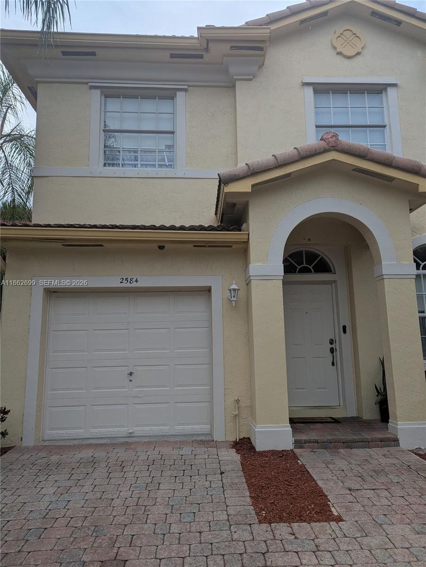 LOVELY 4/3.5 TOWNHOME WITH ONE CAR GARAGE. SPACIOUS FLOORPLAN. LARGE MASTER BEDROOM WITH WALK IN CLOSET. FORMAL LIVING ROOM AND FAMILY ROOM. NEW WOOD FLOORS. GATED COMMUNITY WITH 24 HR SECURITY, COMMUNITY POOL, AND CLUBHOUSE. MUST SEE!!!