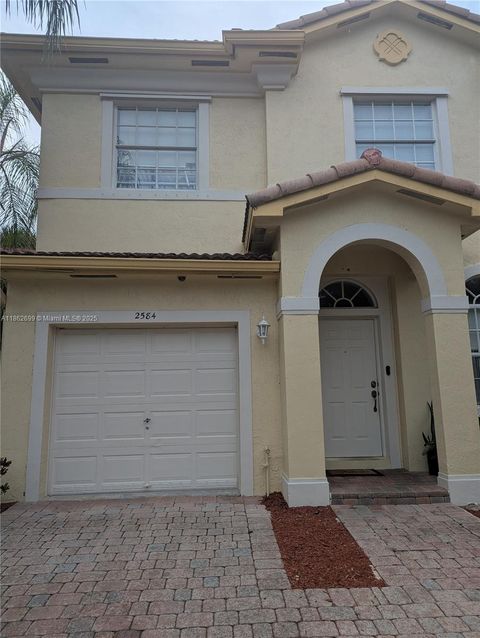 Photo of 2584 SW 84th Ter #101, Miramar, FL 33025 (MLS # A11862699)