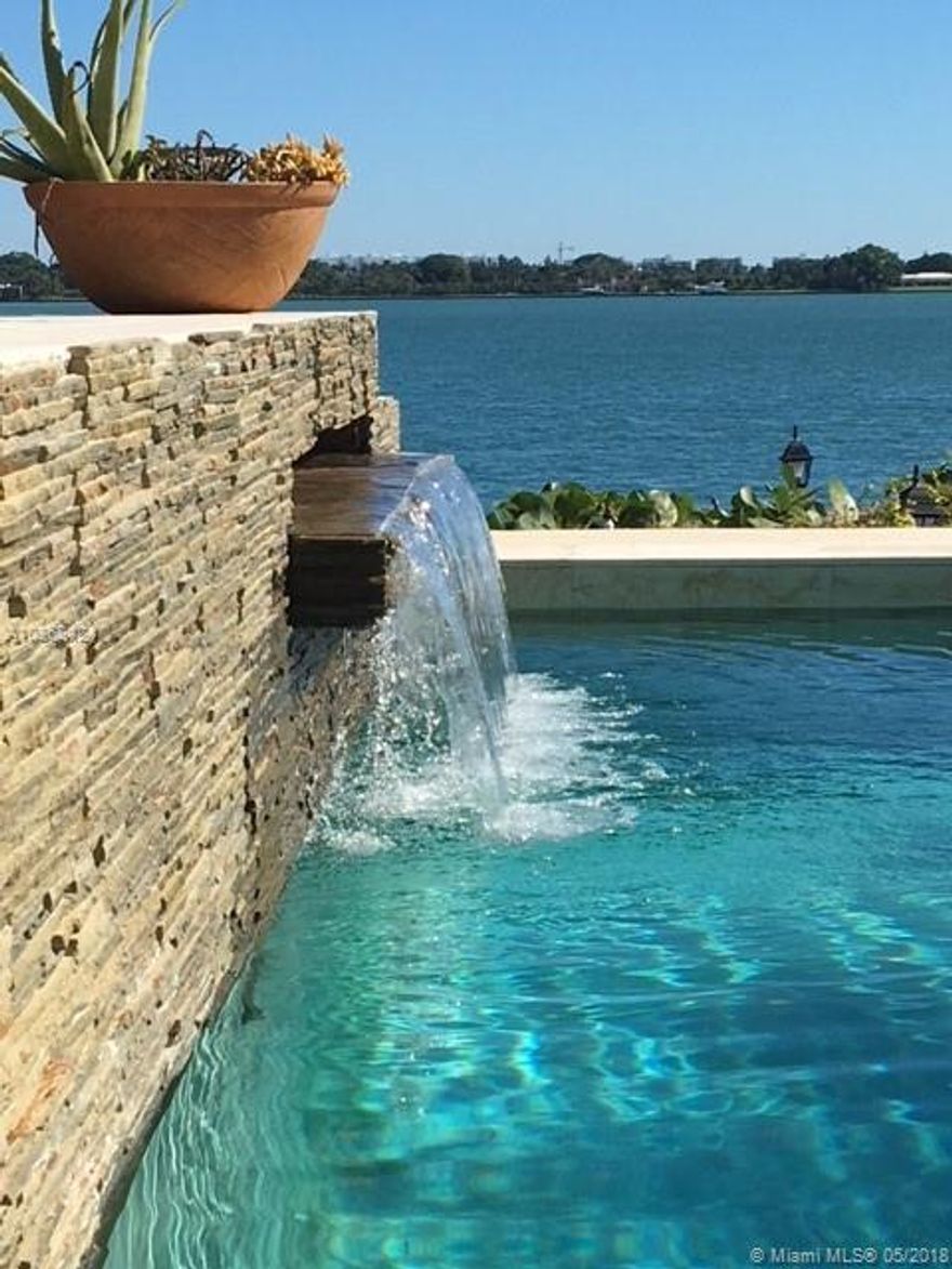 DRASTICALLY REDUCED! Best view in Miami! Located Directly on Biscayne Bay. Modern 5 bedrooms 5 ½ bath home in Sans Souci Estates.  Property offers Prime Bay Waterfront with 270 ft direct bay on a 17,000 sq ft corner lot. Perfect home for entertaining and privacy on cul-de-sac. Volume ceilings, spacious bedrooms with natural light and beautiful views, an office/6th bed, heated pool, Jacuzzi, 150 ft dock for boats. Must See!