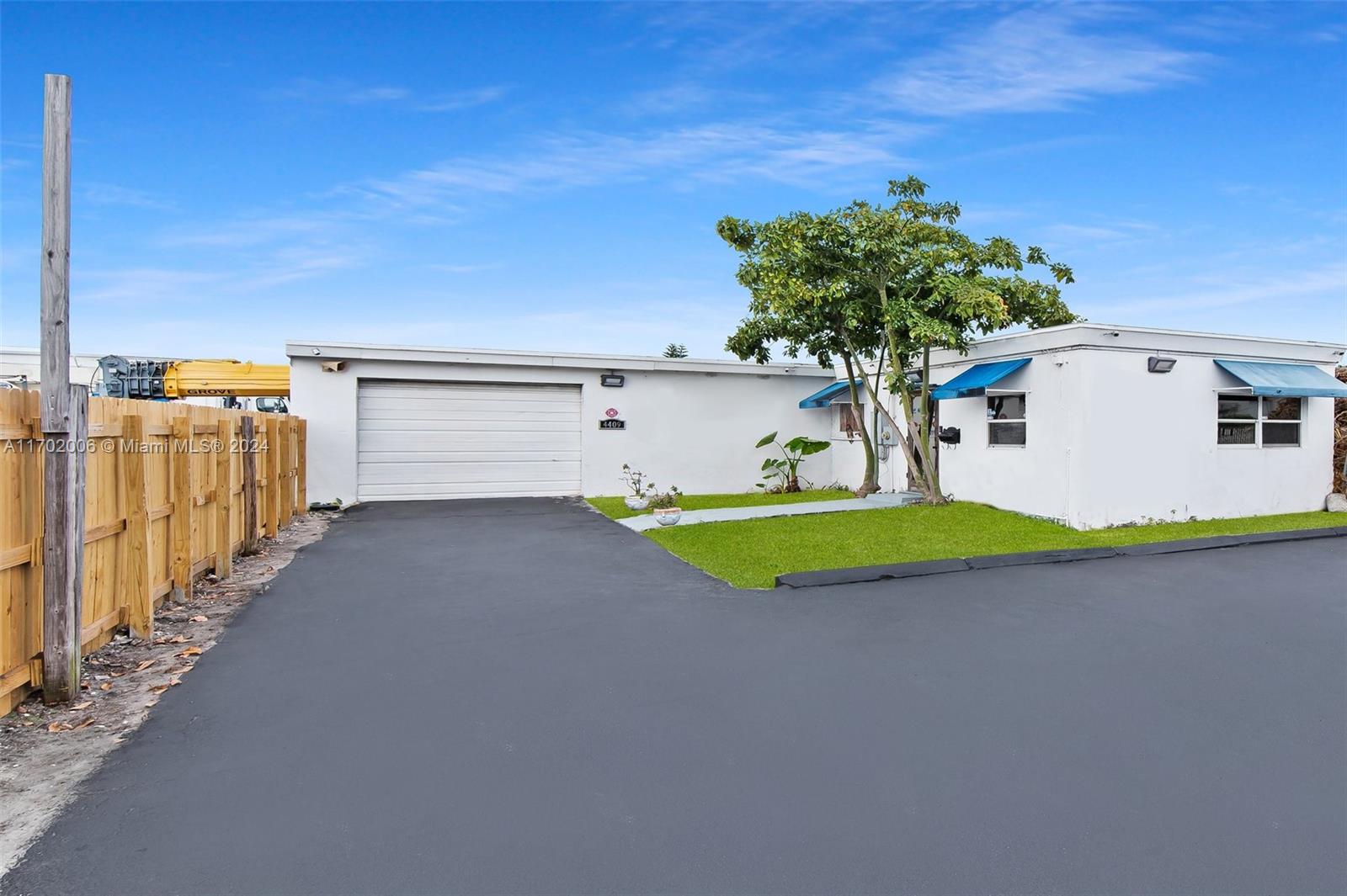 Industrial Warehouse with Office Space located in the heart of Oakland Park's industrial district. Featuring a large office area, conference room & ample warehouse space. Warehouse w/ high ceilings & 8' high garage door, for easy access to heavy equipment, large inventory, or manufacturing operations. Large office space, private conference room & onsite restroom. Parking for 9+ vehicles or space for long trailers, delivery trucks, or heavy equipment. Easy access to major highways & transportation routes, great for distribution and logistics. Whether you're looking for a space for storage, light manufacturing, or admin offices with ample parking for large vehicles, this property offers the flexibility and functionality your business needs.