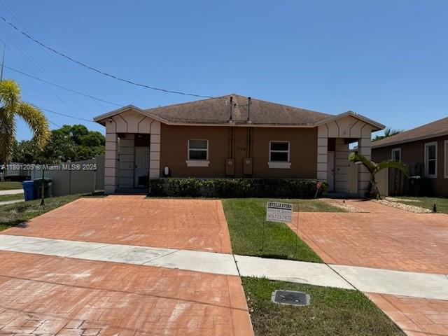 A pristine DUPLEX with two spacious 3 bedroom and 2 baths units, each featuring high ceilings, lots of natural light, an open kitchen, walk-in closets, a laundry room, porcelain floors, blinds throughout, impact windows, automatic sprinklers, and nicely landscaped gardens that are fenced in for complete privacy and entertaining. The duplex is ideally located, walking distance to Jaco Pastorius Park and Funky Buddha Brewery and minutes away from the beach, Wilton Manors, and Ft. Lauderdale airport. The property is unique in that it has two different folio numbers allowing the option to sell each unit separately in the future.