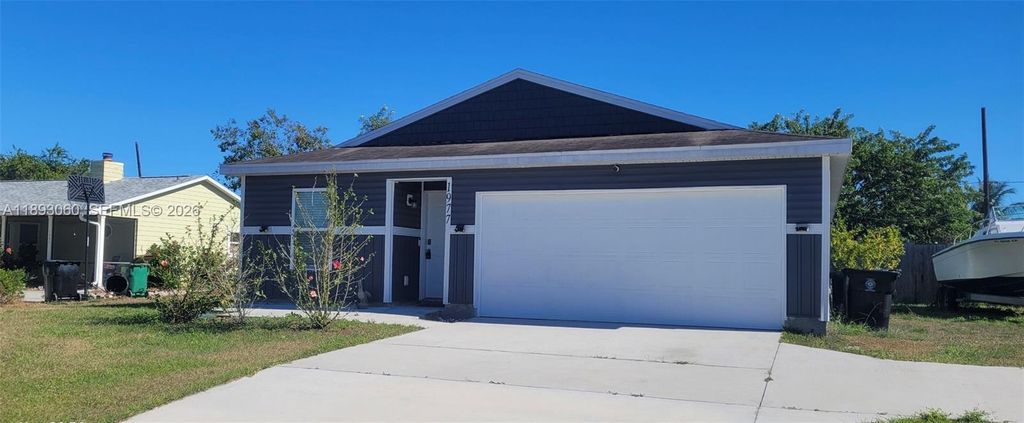 Photo of 1977 SE Floresta Dr, Port St Lucie, FL 34983 (MLS # A11893060)