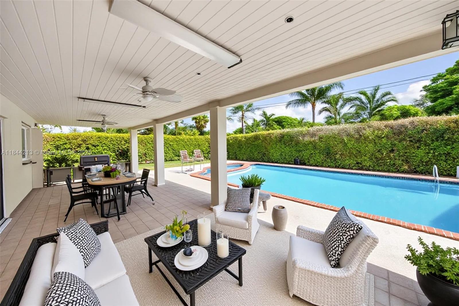 A Rare Find in Miami Springs’ Bird Section!This beautifully updated 5-bed, 3-bath single-story home boasts 2908 sq ft on a 10,160 sq ft lot—ideal for a large family or entertaining guests.The home features a split floor plan, perfect for privacy, a cabana style bath, laundry room, and plenty of storage, including a shed. Enjoy a large newly resurfaced pool and deck (2025), covered patio, and elegant landscaping.Updates include hurricane-protected windows/doors, A/C, EV charger, circular driveway for 5+ cars, and fresh paint inside and out.Turnkey and move-in ready in one of the most sought-after neighborhoods!