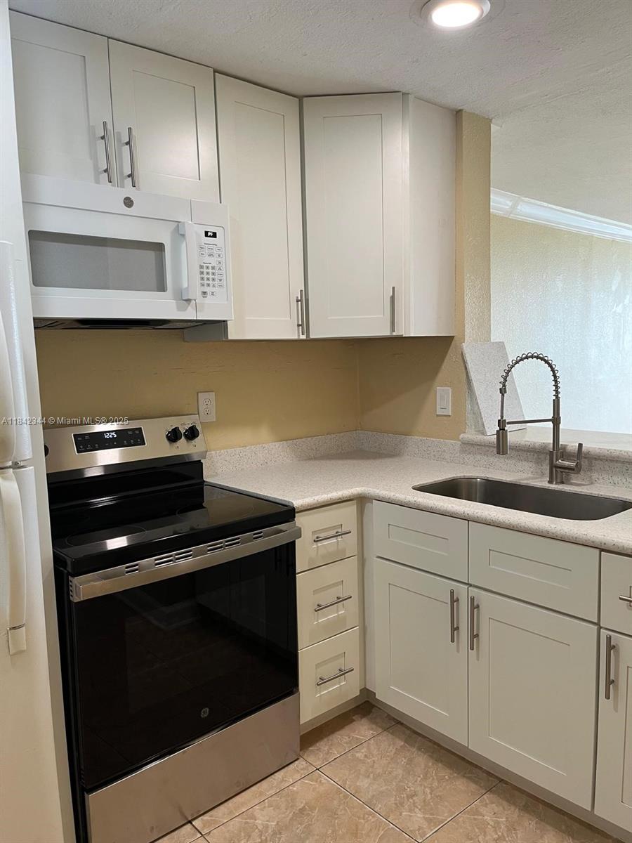 494 NW 165th St Rd C-403