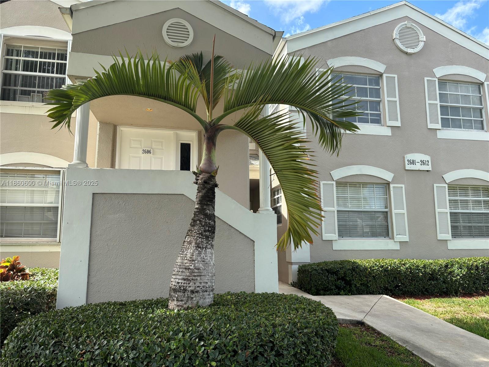 Remodeled kitchen with wood cabinets and Corian countertops, brand new porcelain floors throughout, eat-in kitchen. This is the largest 2/2 model with 1160 sqft. Home was freshly painted, washer and dryer inside unit, plus accordion hurricane shutters. Master bedroom opens to the balcony. Enjoy all the community amenities, including the pool, jacuzzi, gym, and multiple pool tables. Within walking distance of a great school, with 24-hour security and a gated entrance.