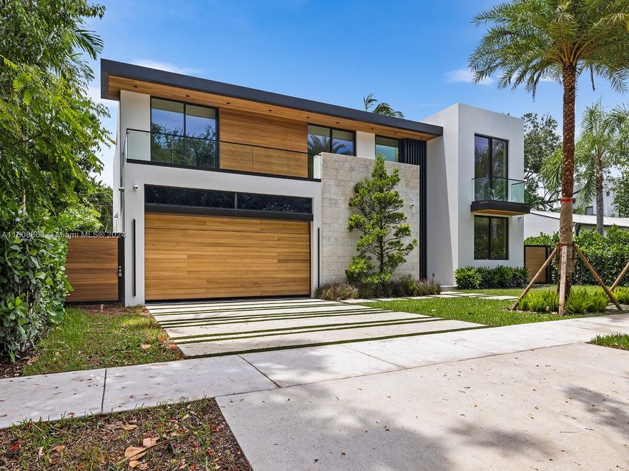 Welcome to this stunning contemporary home located in the High Pines neighborhood. Spanning over 4,995 sqft, it boasts 6 bedrooms and 6.5 bathrooms + a 2-car garage with built-in cabinets. The high ceilings + floor-to-ceiling windows flood the interior with natural light. The 48” X 48” Italian porcelain tile flooring adds elegance. The open kitchen features a top-of-the-line Sub-Zero/Wolf appliance package, Pedini custom cabinetry, a bar, and a Subzero wine tower for 160+ bottles. The primary bedroom offers a luxurious and spacious ensuite spa-like bathroom + a spacious master walk-in closet by Italkraft. All bathrooms have ItalKraft Vanities, Toto Toilets + Graff fixtures. Step outside to your private terrace and enjoy the pool and full Summer Kitchen. Sonos Sound system throughout!