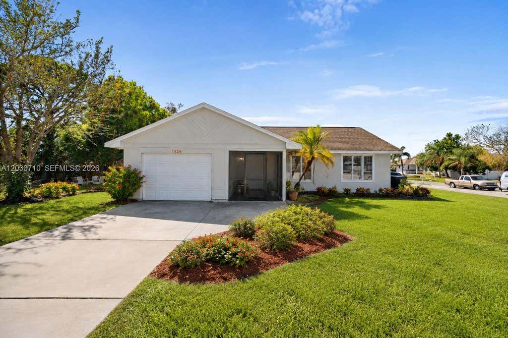 Photo of 1526 SE Port St Lucie Blvd, Port St Lucie, FL 34952 (MLS # A12030710)