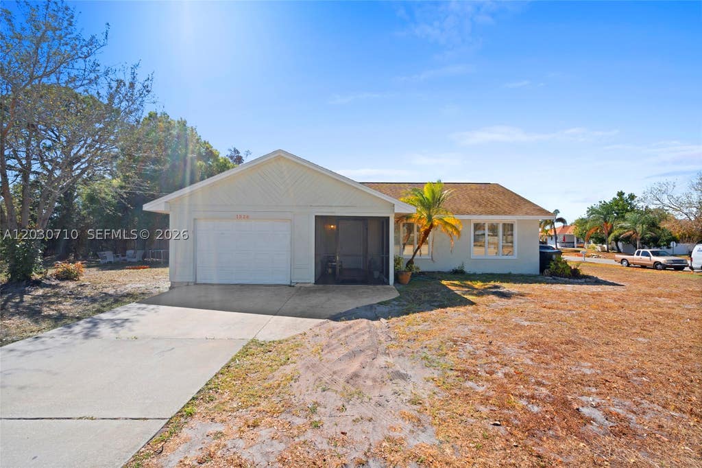 Photo of 1526 SE Port St Lucie Blvd, Port St Lucie, FL 34952 (MLS # A12030710)